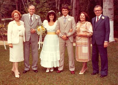 Roberto and Maureen with parents at wedding in 1983